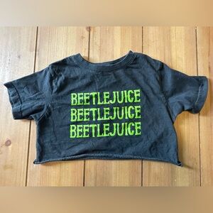 Toddler girl size 6 months but we wore up until 3T as a cropped shirt